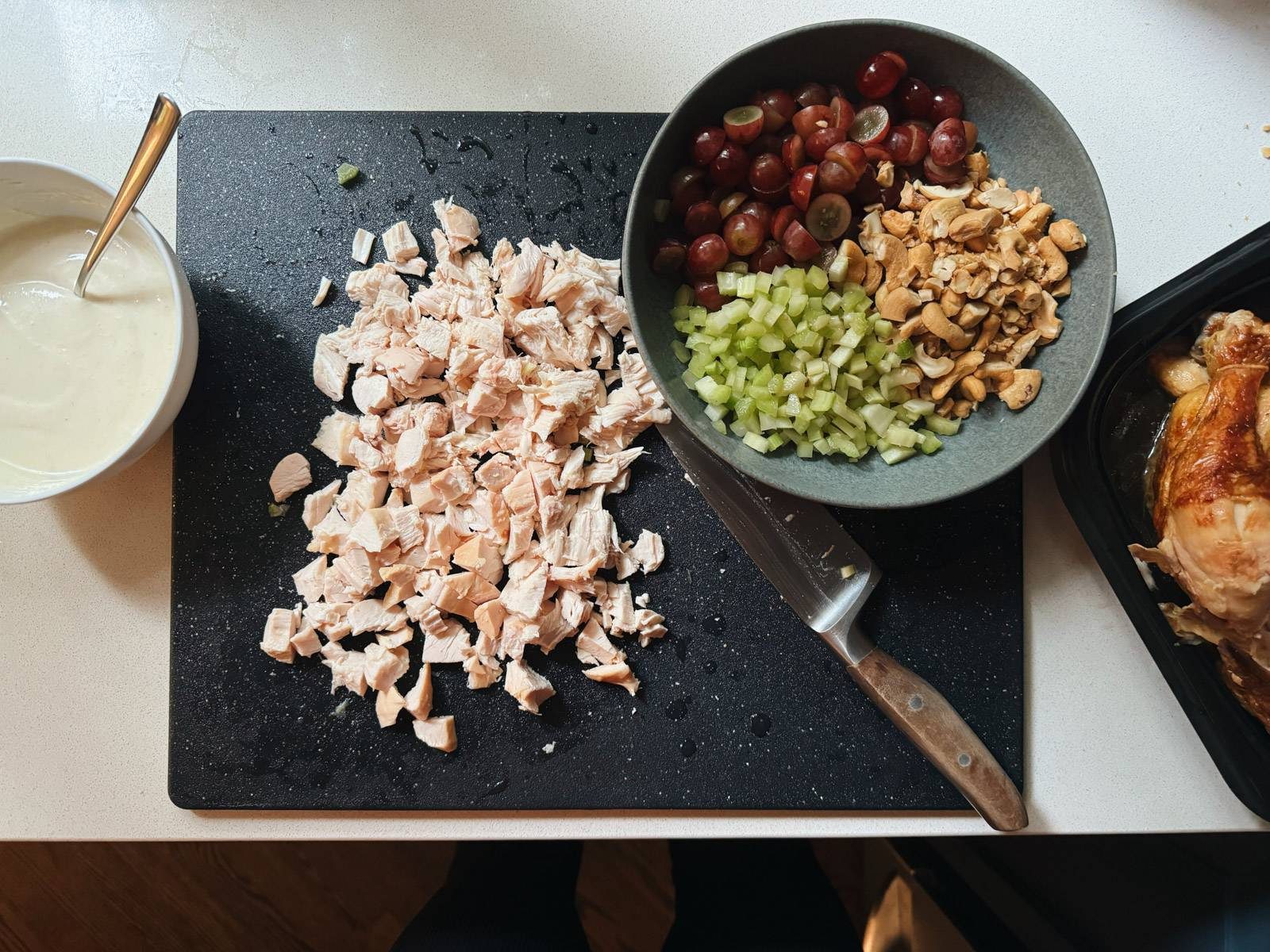 Chopped chicken and other salad ingredients.
