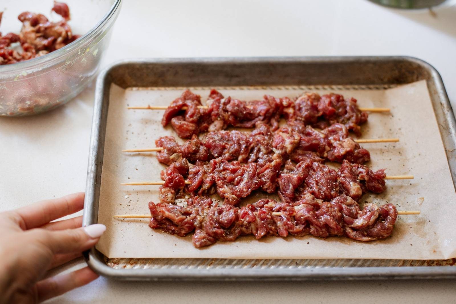 Steak strips on skewers.
